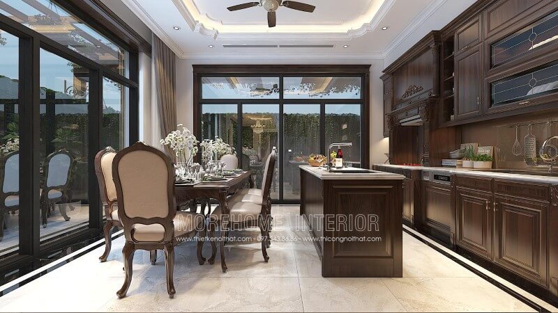 Mẫu tủ bếp tân cổ điển có đảo bếp được bố trí tại trung tâm phòng bếp tạo nên 1 khu nấu nướng riêng biệt, giúp việc công việc nấu nướng của chị em nội trợ trở nên thuận tiện hơn. Thiết kế và sản xuất tủ bếp đẹp